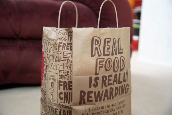 Eating Chipotle Keto: A Low-Carb Lover's Guide 12 Chipotle paper bag with the text "real food is really rewarding."