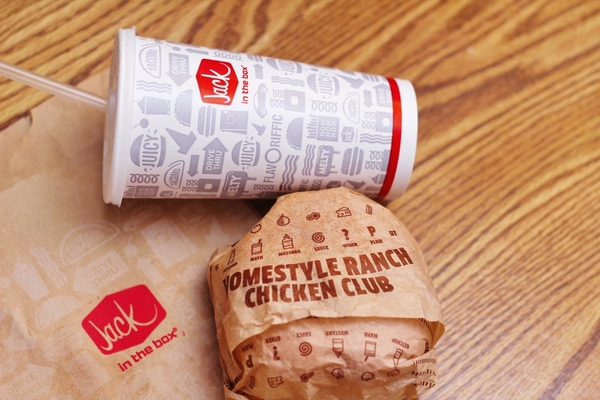 Jack in the Box homestyle ranch chicken club sandwich with a soft drink cup 