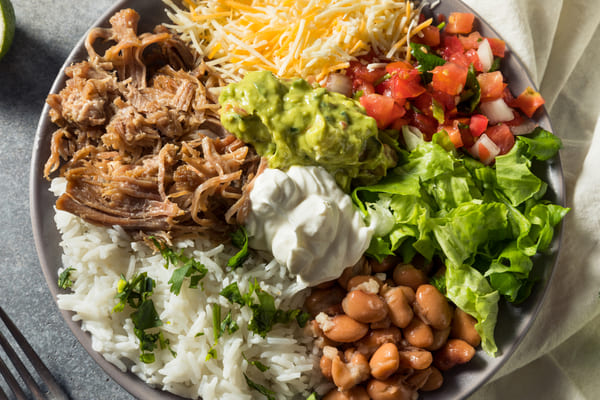 Keto Taco Bell: Enjoy Fast Food Without Breaking Your Diet 5 Mexican burrito bowl with beans, guacamole, and rice