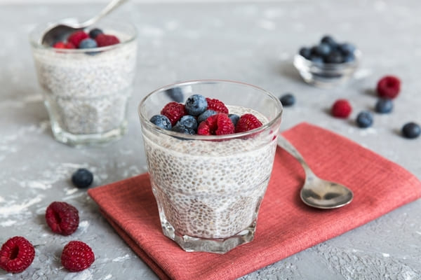 Chia pudding in glasses served with berries