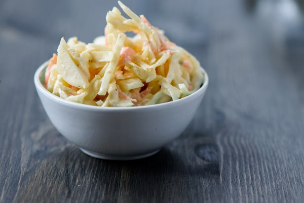 Keto Coleslaw Done Right: Crunchy, Creamy, and Low-Carb! 2 Coleslaw served in a small white bowl