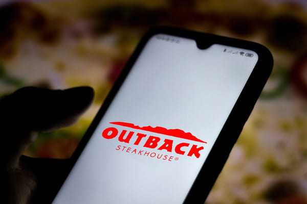 Outback Steakhouse Keto Hacks: Delicious and Low-Carb 7 Outback Steakhouse logo on a phone screen