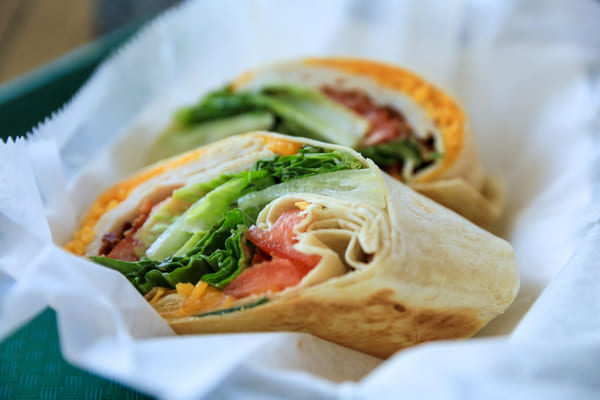 Turkey club wrap with bacon, lettuce, and cheese