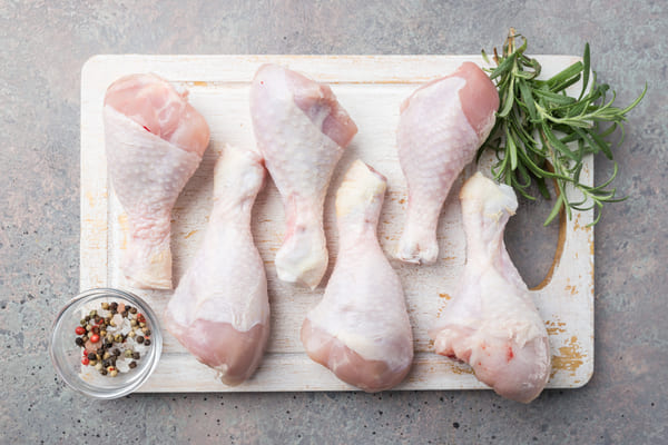 Trader Joe's Keto Staples: Stock Up on Low-Carb Ingredients 6 Chicken drumsticks with herbs and spices on a wooden board