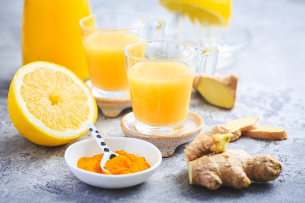 Jamba Juice Keto: Sip Your Way to a Healthier Lifestyle 6 Ginger lemon shot with fresh slices of ginger and lemon
