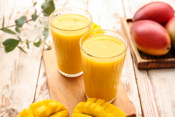 Fresh mango juice in glasses