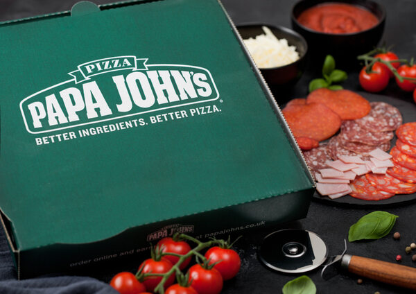 Papa Johns pizza box with toppings: meats, tomatoes, and sauces