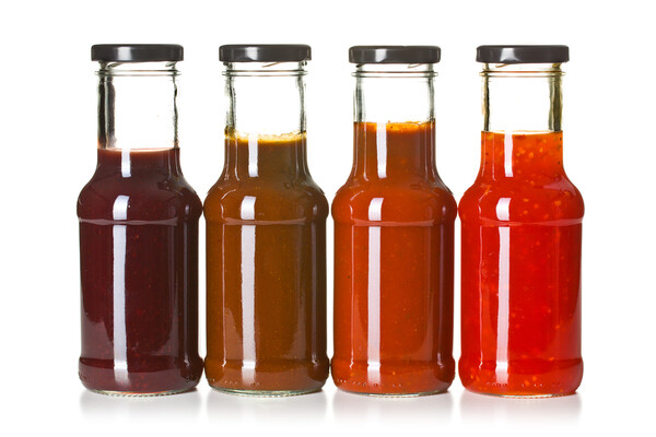 A variety of homemade sauces in bottles