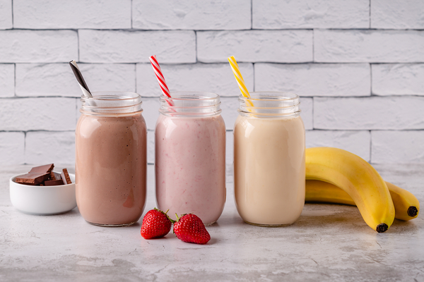 Is Shakeology Keto Friendly? A Comprehensive Guide 4 A collection of glasses filled with protein shakes in various flavors, offering a variety of delicious and nutritious options.