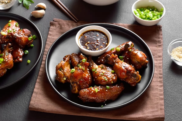 Is Soy Sauce Keto? A Comprehensive Guide for Keto Diet 4 Succulent Cooked Chicken Drizzled with Tempting Soy Sauce.