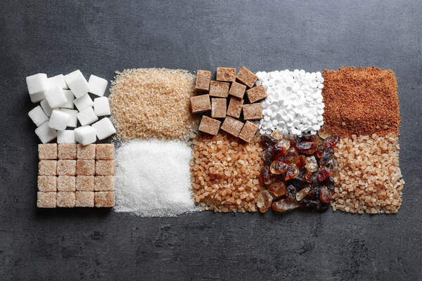 Different types of sugar arranged on a table