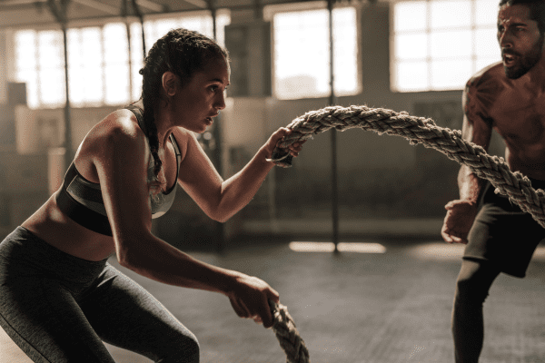 A photo capturing a moment of intense exercise, showcasing physical exertion and dedication to fitness.