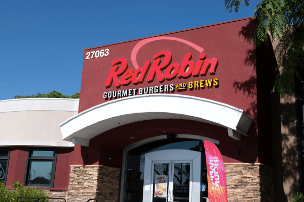 Prominent front signage of 'Red Robin Gourmet Burgers,' featuring the restaurant's name and logo.