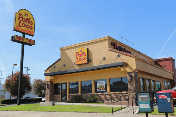 The building of an El Pollo Loco restaurant, showcasing its architectural design and branding.