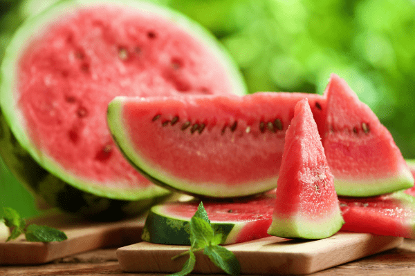 Is Watermelon Keto? Understanding the Carb Content 3 Slices of ripe and succulent watermelon, ready to enjoy as a refreshing and hydrating snack.