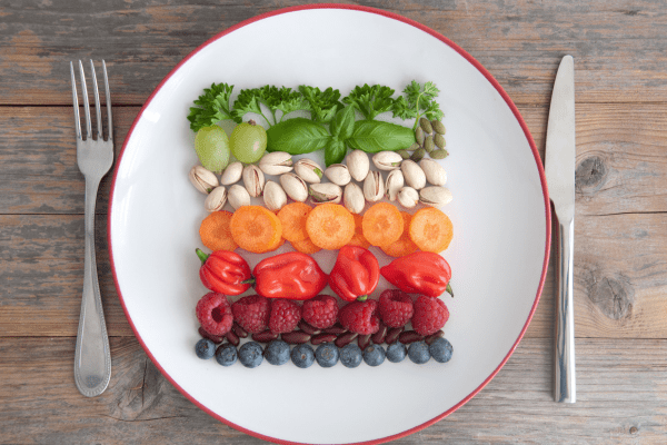 Is Watermelon Keto? Understanding the Carb Content 6 A plate of colorful and assorted fresh fruits.