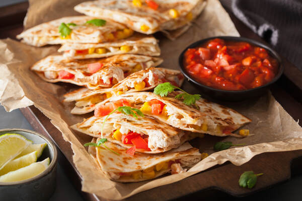 Chicken quesadillas with sweet corn and tomatoes