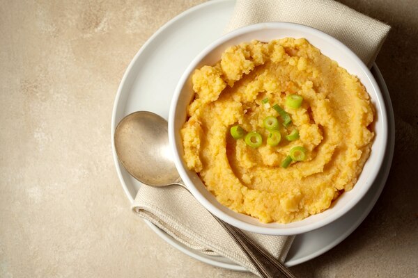 Rutabaga Recipes: Transform Your Meals With These Ideas! 4 A bowl of mashed rutabagas garnished with green onions