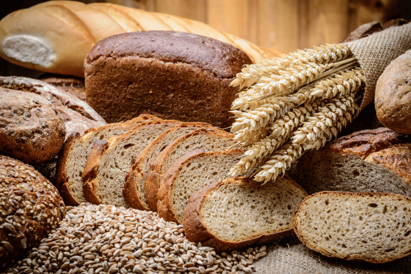 Aunt Millie's Low Carb Bread: The Ultimate Guide 5 An assortment of different types of wheat bread, showcasing the diversity of textures, grains, and flavors within the category of wheat-based bread.