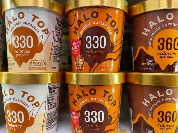Halo Top Keto Hacks: Satisfy Your Sweet Tooth Without Guilt 6 Halo Top ice cream pints in sea salt caramel, peanut butter cup, and chocolate caramel lava cake