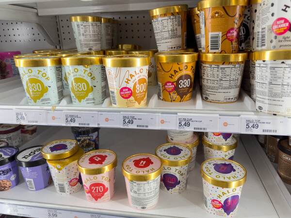 Halo Top Keto Hacks: Satisfy Your Sweet Tooth Without Guilt 4 Pints of Halo Top ice cream displayed at a grocery store