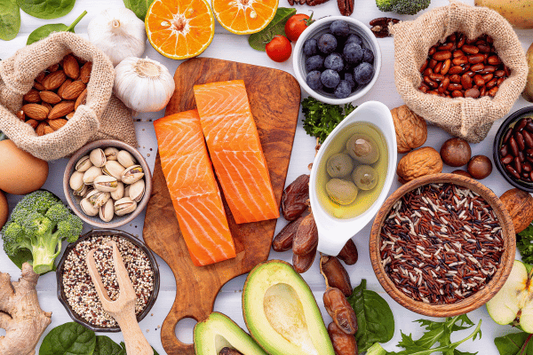 Vibrant assortment of fresh produce and wholesome ingredients arranged on a clean white backdrop, inviting you into a world of nutritious possibilities.