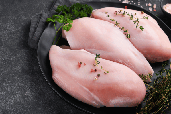 10 Keto Chicken Breast Recipes for a Vibrant Lifestyle 2 Keto Chicken Breast Recipes: Raw chicken breasts, expertly prepared and ready to be cooked, showcasing their fresh and uncooked state, awaiting transformation into a delicious meal.