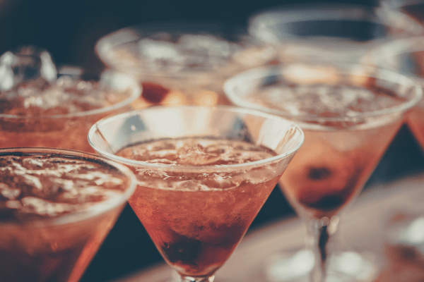 Pink Whitney Carbs: A tempting pile of pink cocktail drinks, showcasing an array of refreshing and vibrant beverages, promising a visually appealing and flavorful experience.