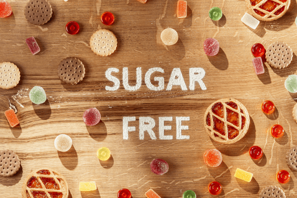 Sugar Free Nutella: Satisfy Your Sweet Tooth Guilt Free 2 A photo of a spread of sugary foods and candies, with a label indicating "sugar-free," showcasing a selection of sweet treats that are crafted without added sugars