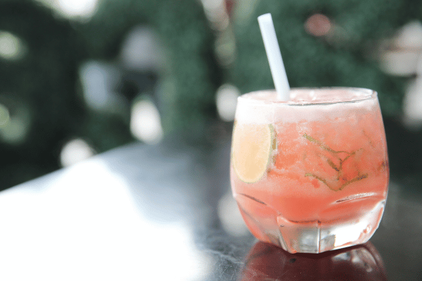 Pink Whitney Carbs: A simple and elegant glass of pink cocktail, exuding a delightful and refreshing appeal with its enticing color.