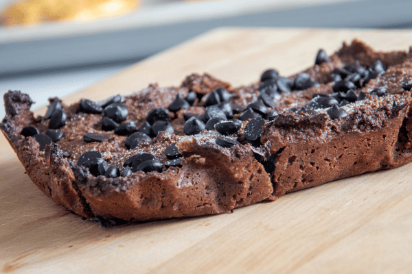 Decadent chocolate ketogenic baked dessert brownies made with erythritol sweetener, offer a delightful low-carb treat for those adhering to a ketogenic lifestyle.