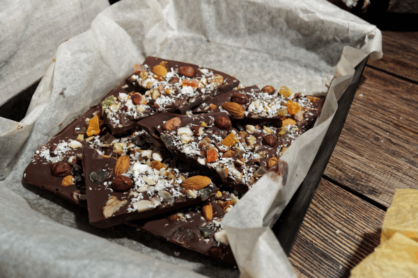 Coconut oil chocolate bark, a delicious and nutritious treat made with the goodness of coconut oil and dark chocolate, offering a satisfying and guilt-free indulgence.