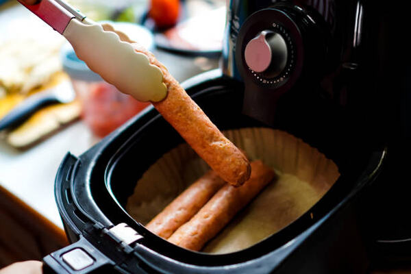 Air Fryer Corn Dogs Delight: Crispy Goodness in Every Bite! 8 Sausages cooked in an air fryer