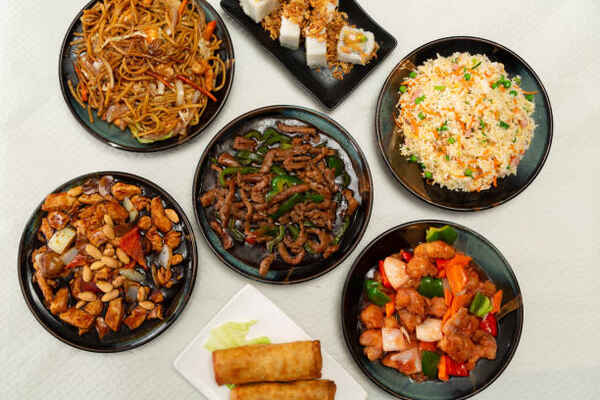 PF Changs Keto Menu: Unleashing Flavor Without the Carbs 3 An assortment of Chinese food in black plates