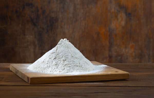 Is Carbquik Keto-Compatible? Insights and Considerations 4 A heap of low-carb flour on a wooden board