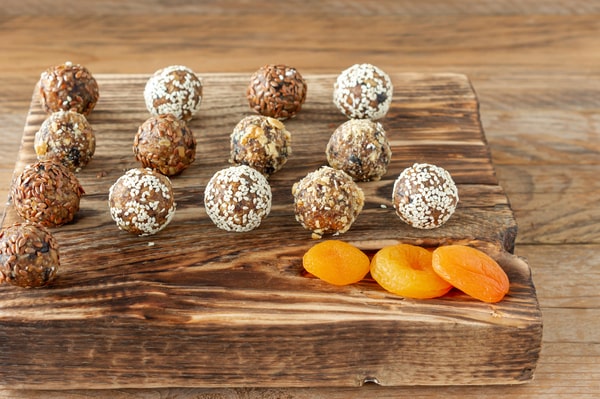 Keto Energy Balls: Energize Your Day With Amazing Recipes! 4 Energy balls served on a wooden board