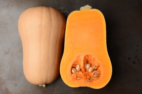 Is Squash Keto: Carbs, Varieties, and Recipes Explained 6 Is Squash Keto: Butternut Squash Sliced in Half.
