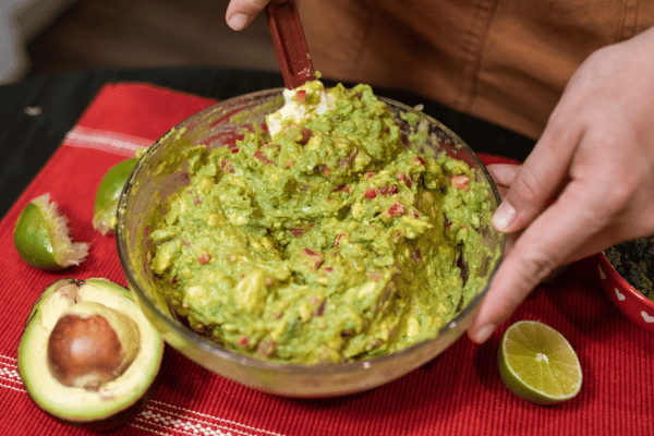 Person Making a Healthy Guacamole Recipe.