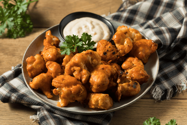 Baked Cauliflower Head Recipes You Must Try at Home 7 Homemade Spicy Buffalo Cauliflower Wings.
