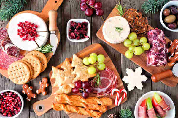 Keto Charcuterie Board Bliss: A Symphony of Low-Carb Taste 14 Christmas-themed charcuterie with crackers, meat, cheese, and fruits