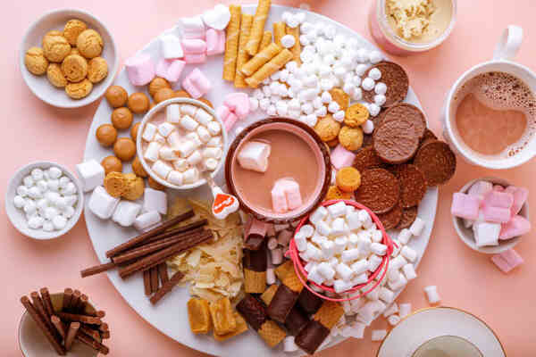 Keto Charcuterie Board Bliss: A Symphony of Low-Carb Taste 11 Dessert charcuterie board with marshmallows, cookies, and hot chocolate