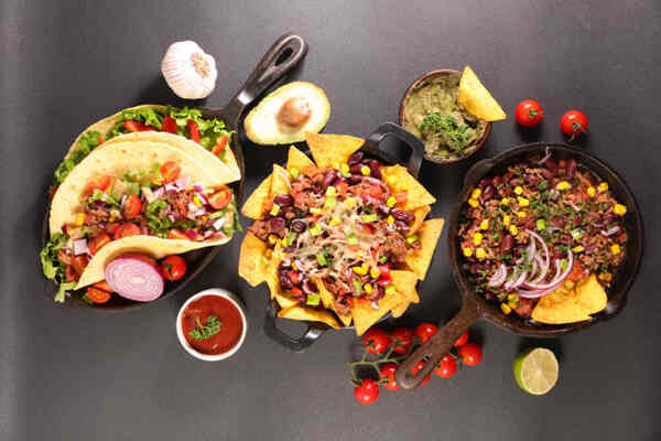 Keto Nachos Recipe: Crunchy Low-Carb Bliss in Every Bite 7 Servings of traditional Mexican dishes including tacos, nachos, and carne picada