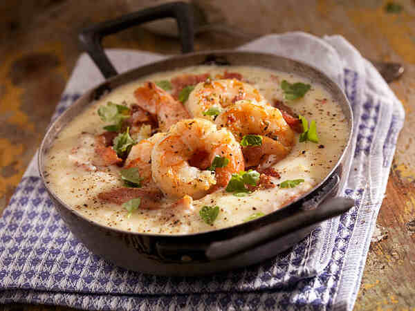 Can You Eat Grits on Keto? Unveiling Tasty Low-Carb Secrets 6 A small pan containing grits and shrimp