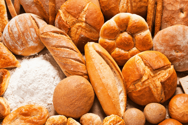 Hero Bread: Unveiling the Secrets of Their Bread 2 Piles of delicious bread.