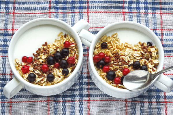 Delicious Kefir Smoothie Recipes to Energize Your Day 6 Healthy breakfast with yogurt or kefir, oatmeal, berries, and seeds.