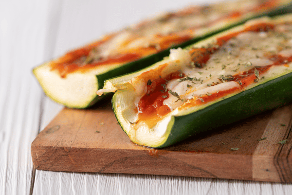 10 Keto Zucchini Recipes to Spice Up Your Low Carb Diet 8 Keto Zucchini Recipes: Two Fresh Hot Zucchini Boats.
