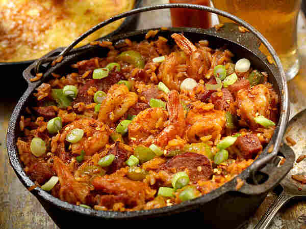 Keto Jambalaya Recipe: A Spicy Twist to Low-Carb Delight 5 Cajun sausage jambalaya served with chopped green onions in a pot