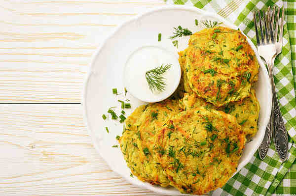 Keto Zucchini Fritters Recipe: Crispy Guilt-Free Indulgence 11 Zucchini carrot fritters with sour cream and herbs