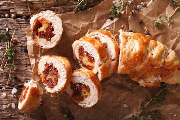 Chicken Bake Costco: Unveiling the Mouthwatering Recipe! 2 Sliced baked chicken rolls with bacon and cheese