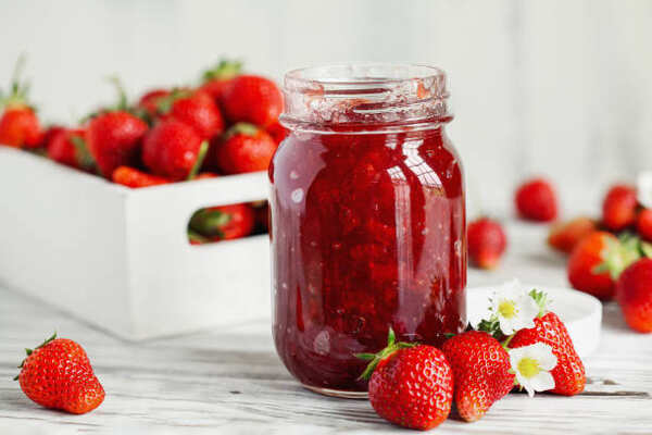 Keto Jelly Recipe: Savor the Sweetness, Skip the Carbs! 3 Homemade keto strawberry jam in a jar with fresh strawberries